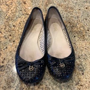 Michael Kor’s flats